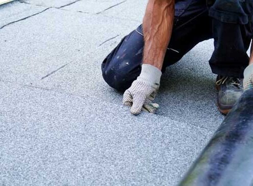 How to Install Roll Roofing on a Flat Roof