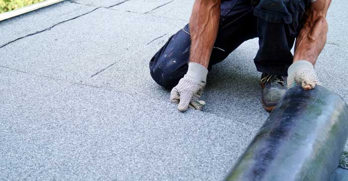 How to Install Roll Roofing on a Flat Roof